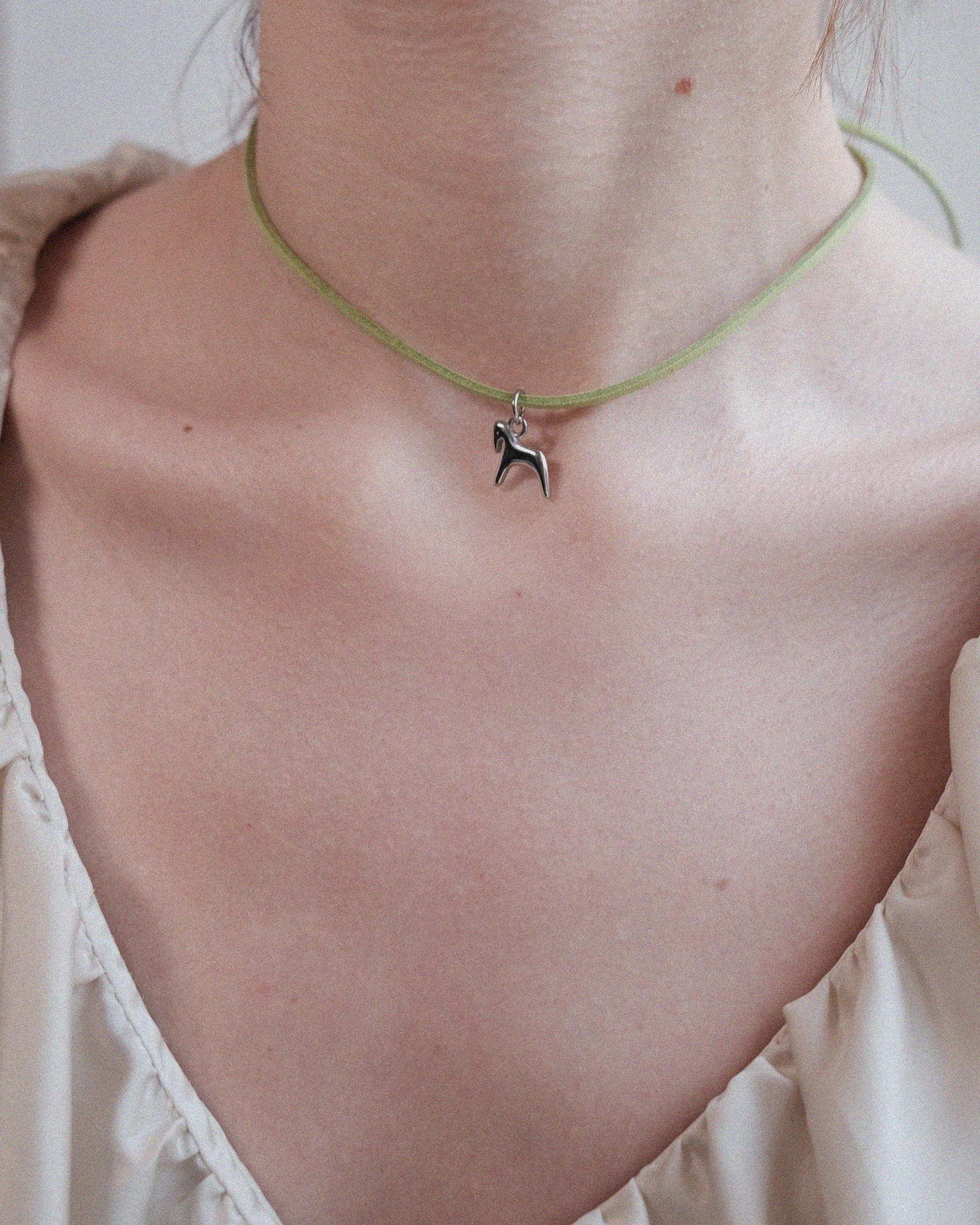 подвеска burdo из стали на замшевом зеленом шнурке