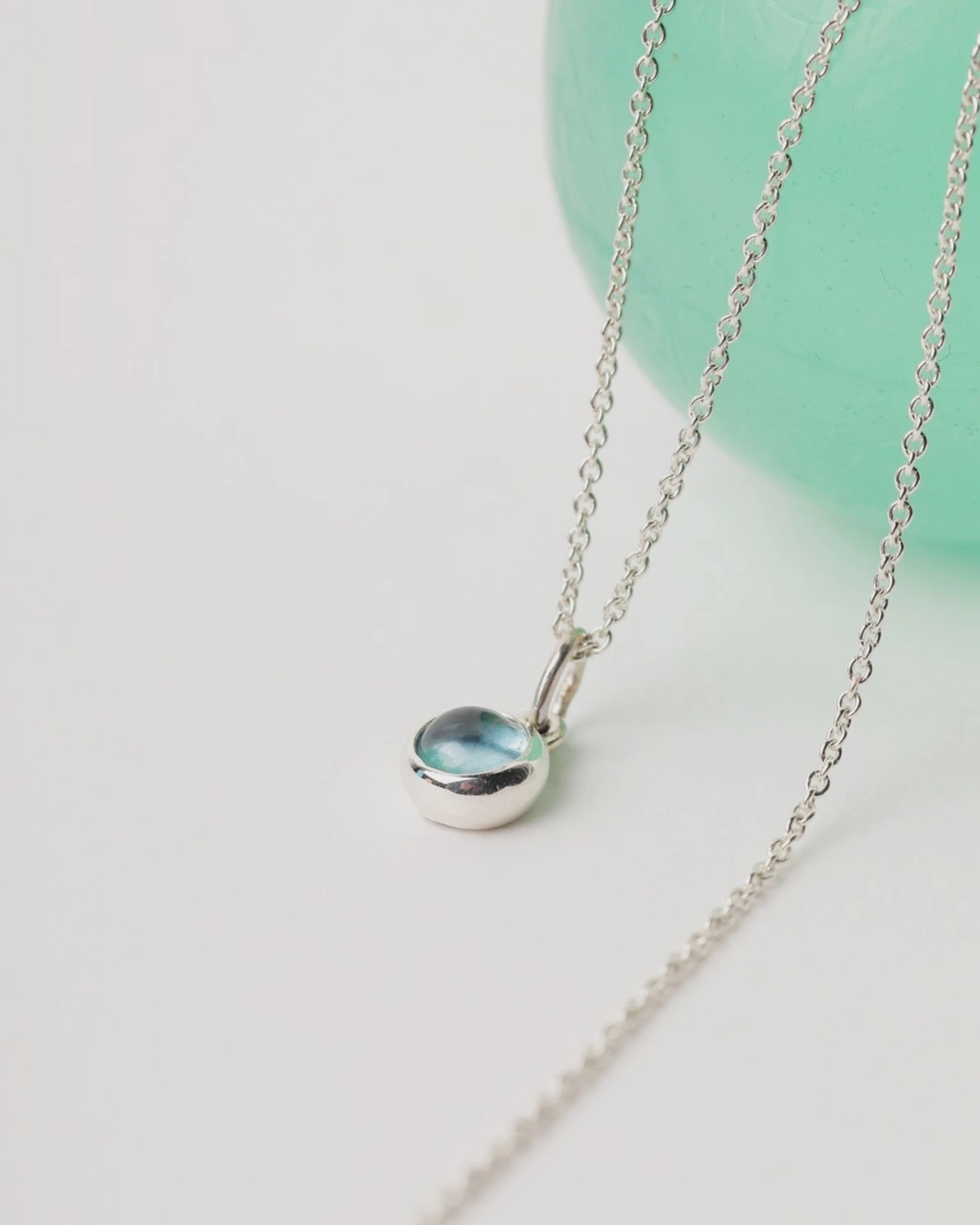 подвеска alpha с голубым топазом (родирование)